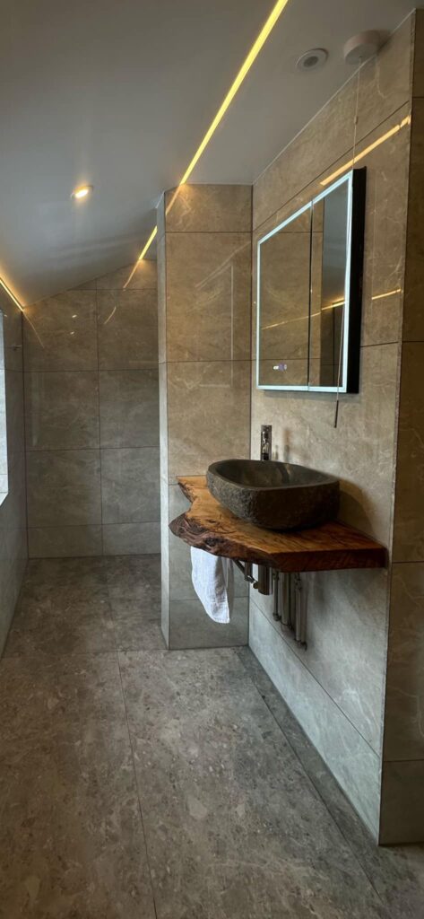 A piece of Oak purchased by Mr Blundell for to mount a bathroom sink.